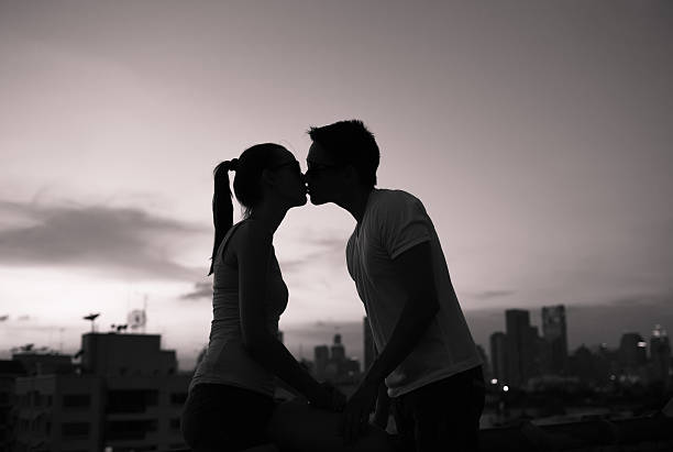 Romantic couple kissing in the city. Relationship Tips